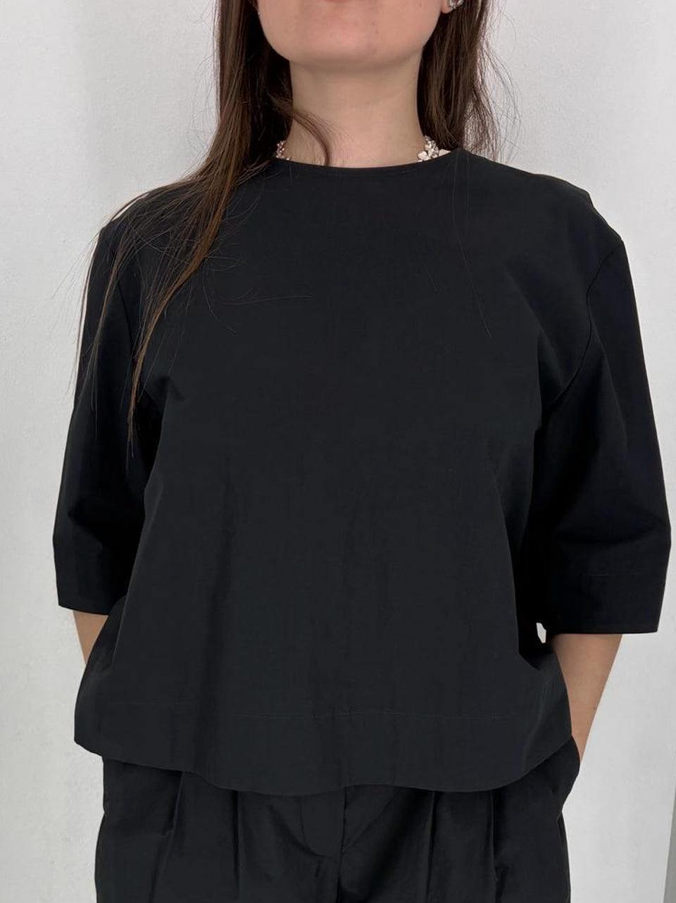 camicia apertura al retro