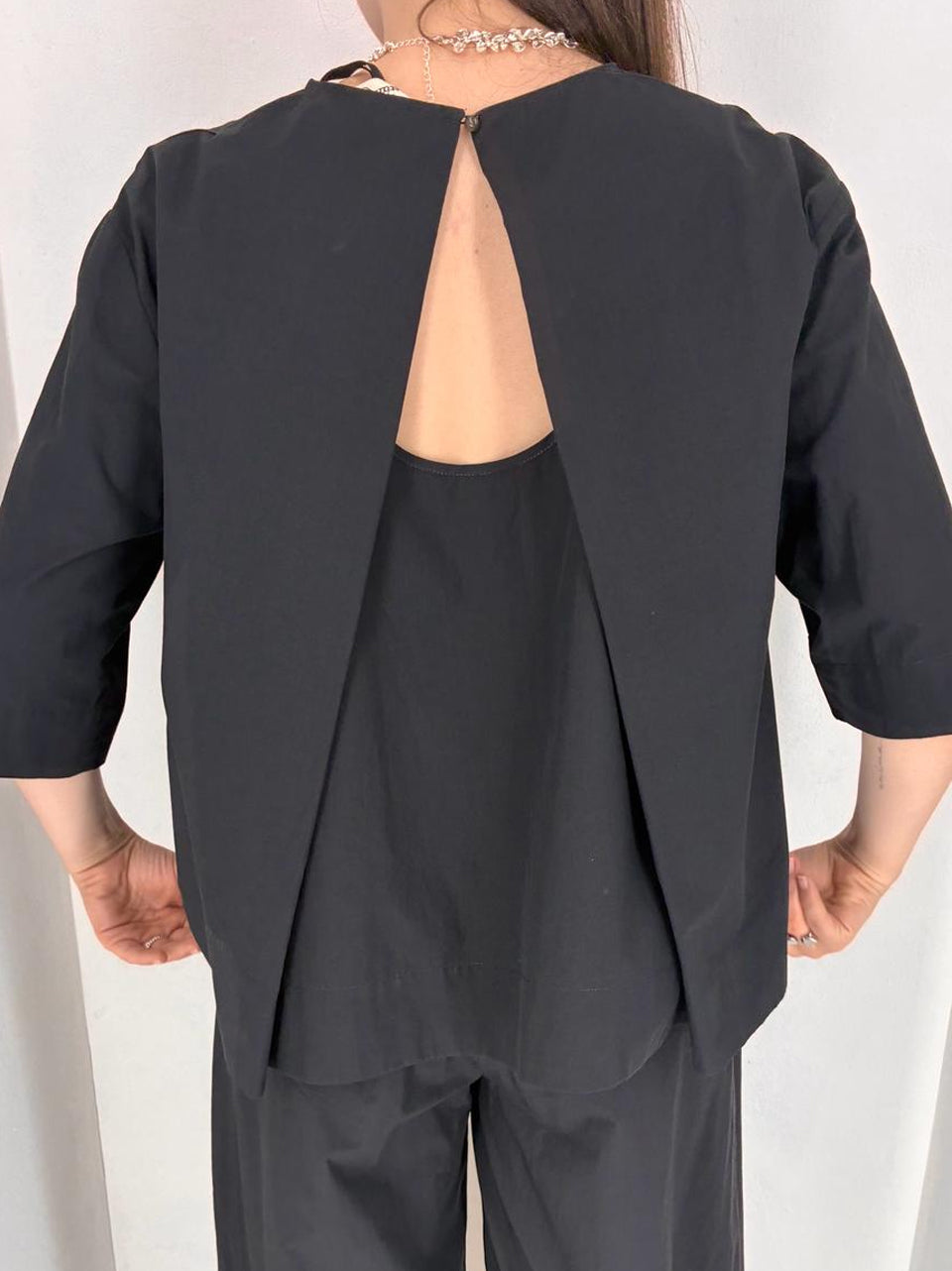 camicia apertura al retro