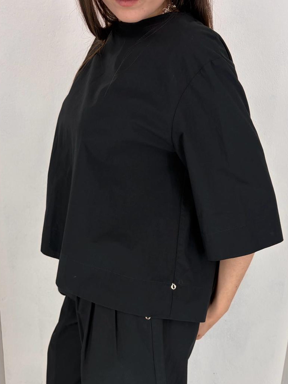 camicia apertura al retro