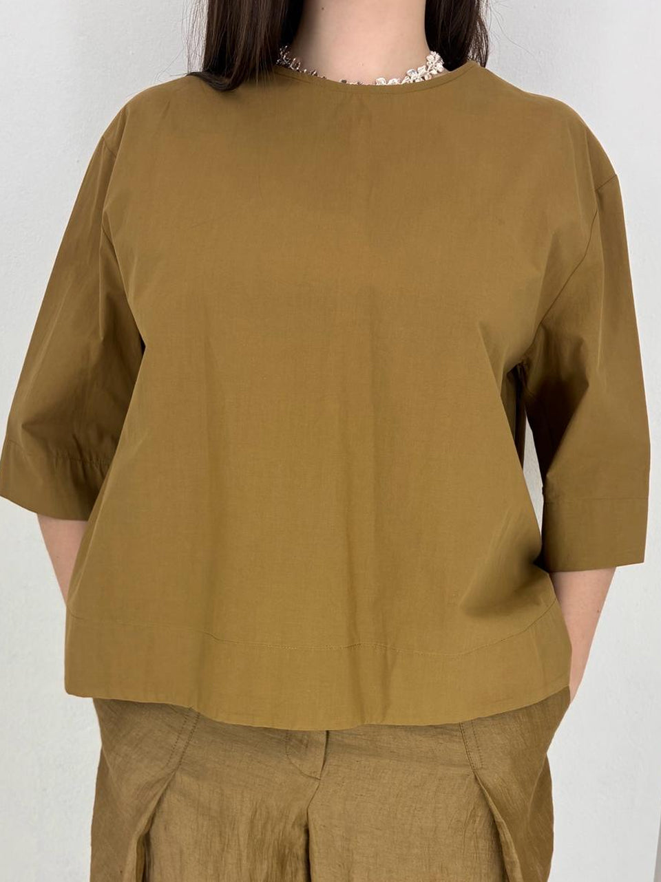 camicia apertura al retro